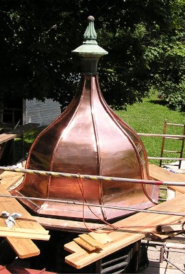 Cupola dome with copper skin and ridge pipes