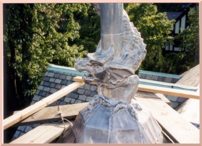 Sea serpent roof finial side view