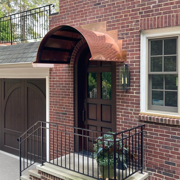 Custom copper roof over side entry 