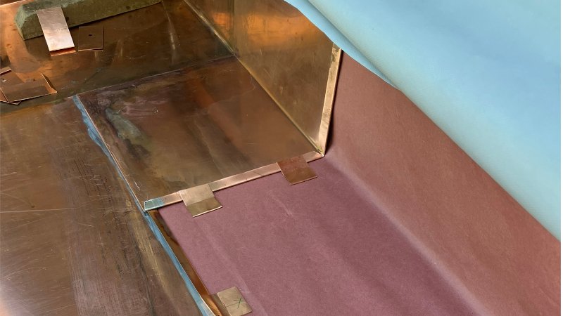 Copper flat panel roofing with cleats for movement