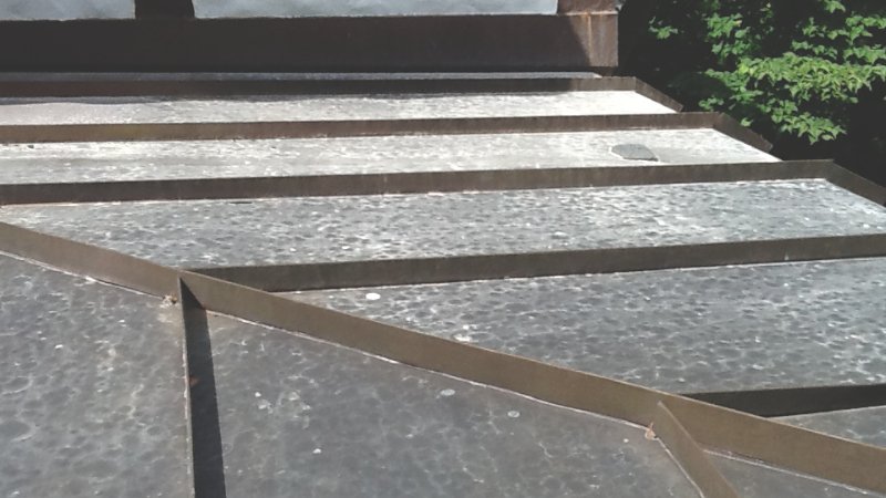 Standing seam copper roofing on flat roof Standing seam copper roofing on flat roof