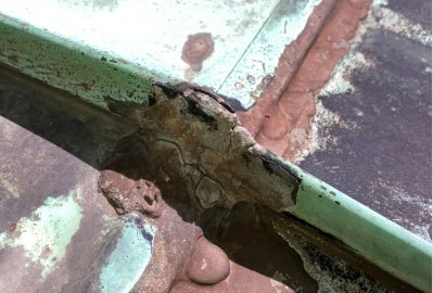 Broken copper roof seams