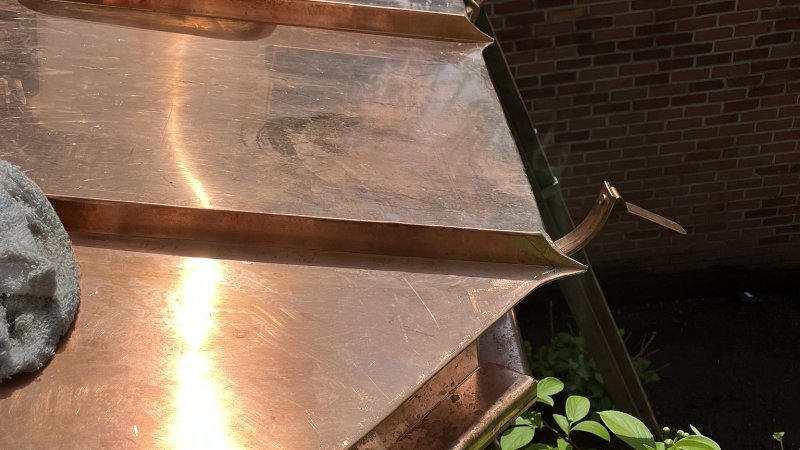 Copper standing seam corner panel