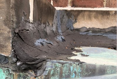 Roof tar removal corner